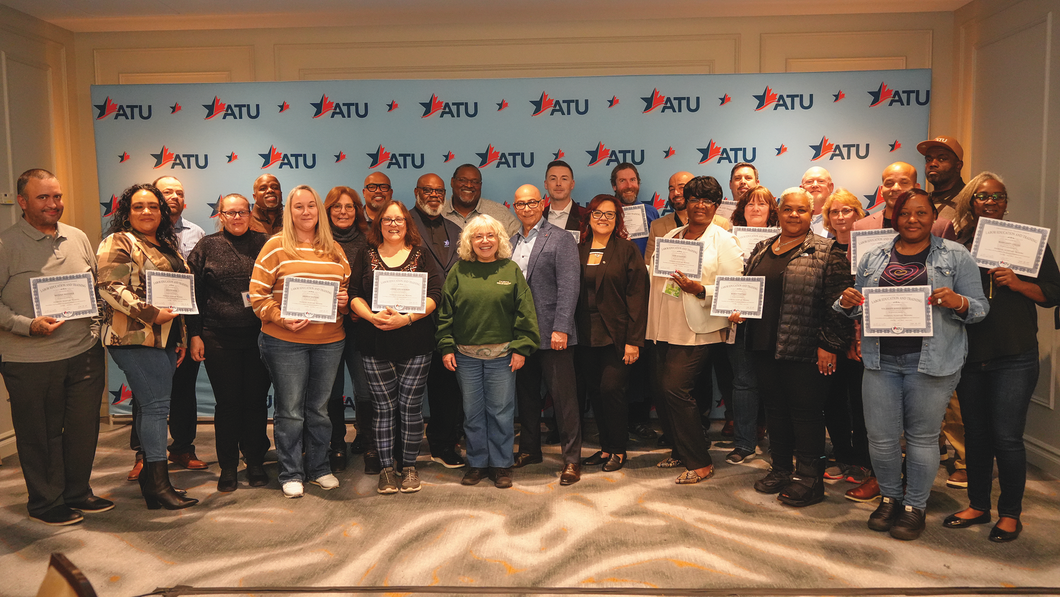 ATU International leadership with Financial Secretary’s after receiving their certificates.